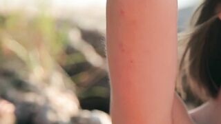 Beauty reveals her adorable body in the nature