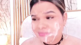 chubby hottie with fake cum on her face sucks a big dildo